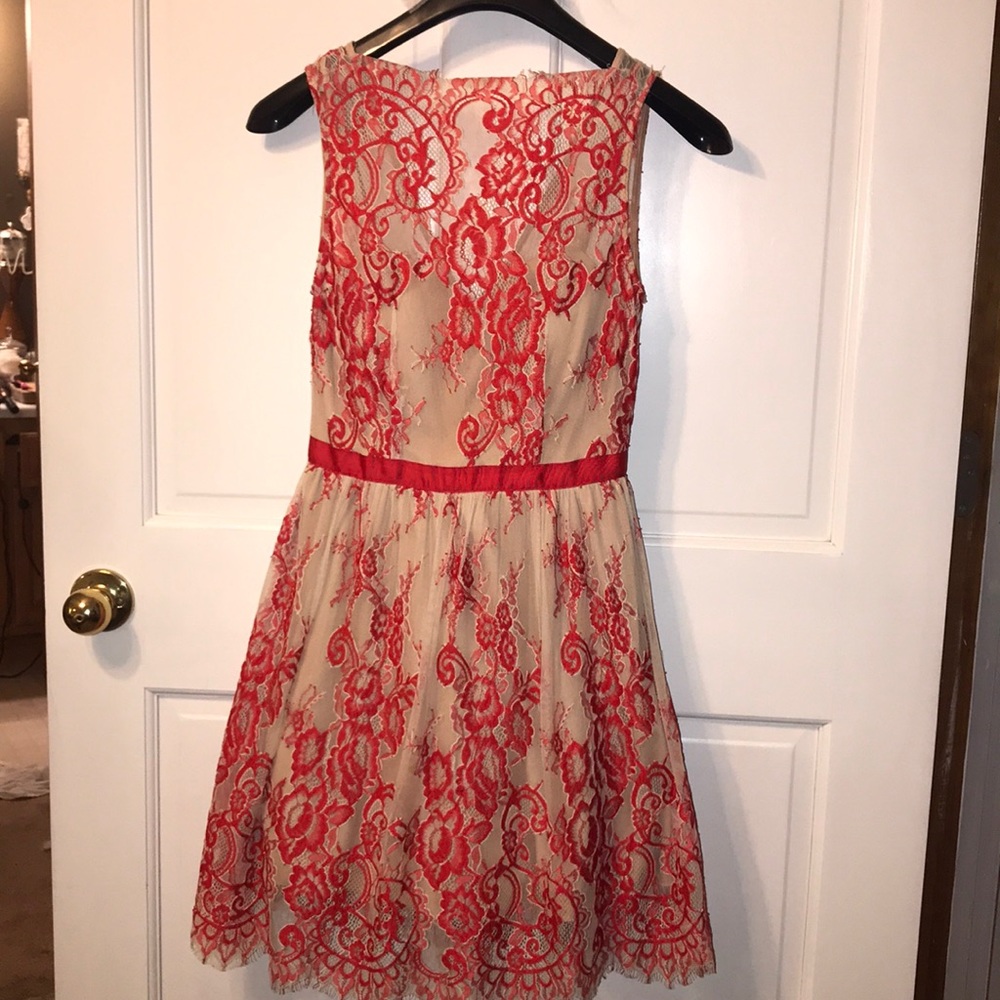 Elegant nude and red lace dress